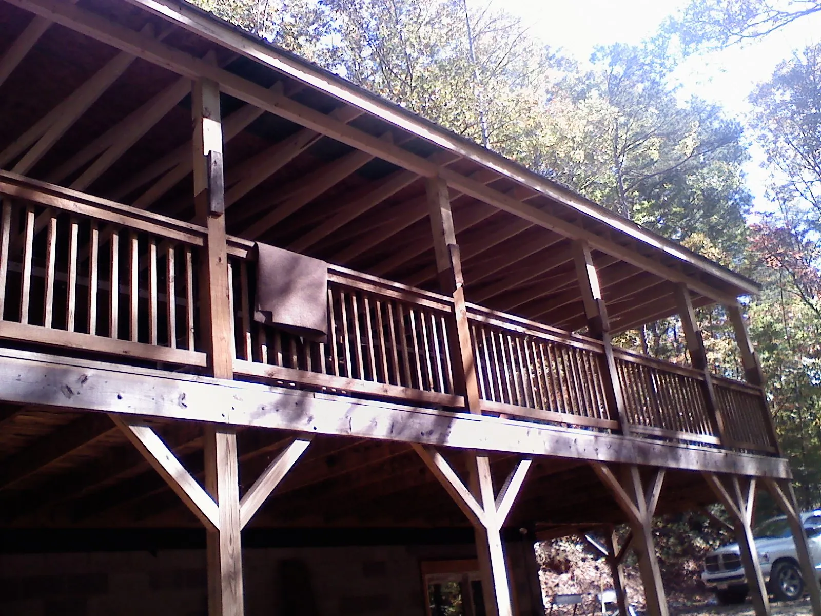 Timber framing under a new elevated porch and deck — Roof Leak Repair in Morriston by Roofing Brothers